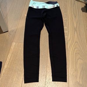 Lululemon black leggings with blue crossed waist